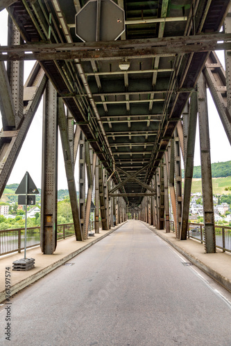 Fototapeta Naklejka Na Ścianę i Meble -  old iron bridge spans river Moselle, bridge is called Canon bridge and serves sicne the 17th century for trains and cars