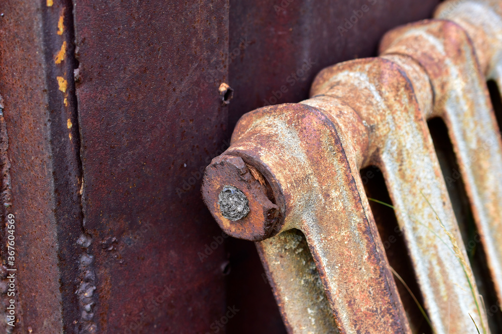 Rusty section of the heating battery in scrap metal Rusty section of the heating battery in scrap metal