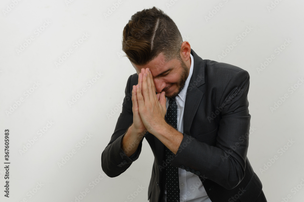 Portrait of handsome bearded Hispanic businessman in suit Portrait of handsome bearded Hispanic businessman in suit
