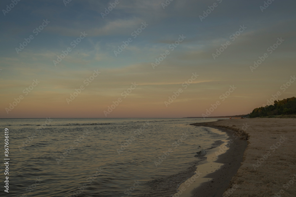 Baltic sea at beautiful sunrise in Latvia beach.