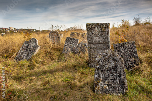 12.10.2019 Satanov Ukraine. Old Jewish cemetery in the fall photo