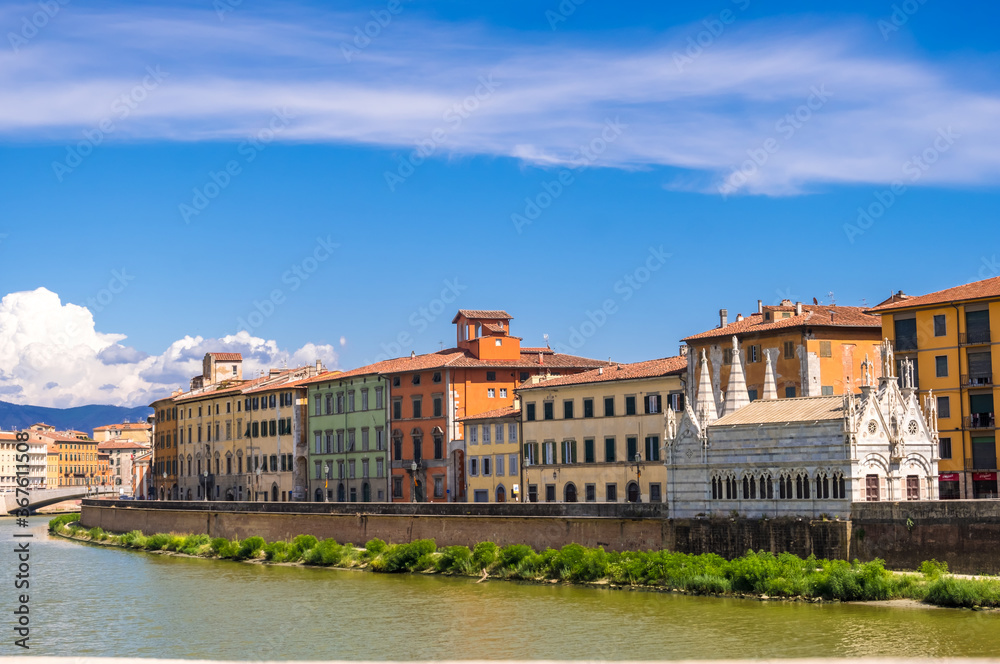 Pisa, Italy - August 14, 2019: Gothic church Santa Maria della Spina on the embankment of the Arno River in Pisa, region of Tuscany, Italy