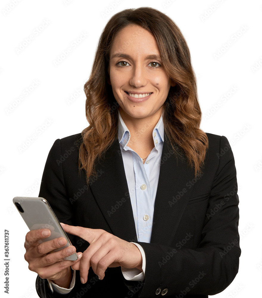 Portrait of a beautiful business woman smiling and pointing on her cell phone - isolated in white background Portrait of a beautiful business woman smiling and pointing on her cell phone - isolated in white background