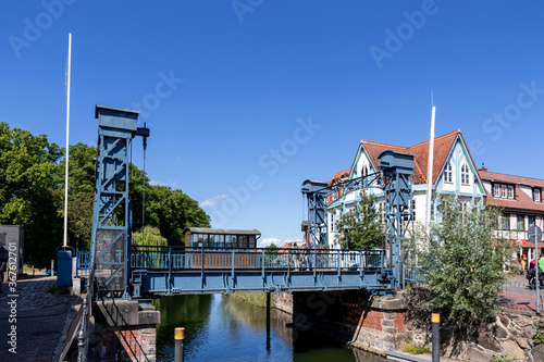 Lift bridge in Plau am See, Germany. It is a steel lift bridge that was built in 1916. With a lifting height of up to 1.86 m, it is the highest lifting bridge in Mecklenburg. photo