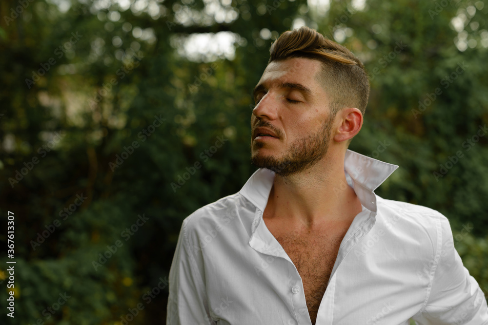 Portrait of handsome bearded Hispanic tourist man outdoors Portrait of handsome bearded Hispanic tourist man outdoors