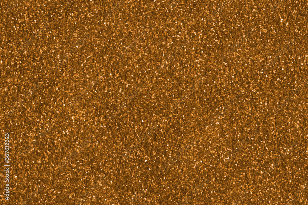 Luxury gold glitter texture with bright sparkles and flickers on the white isolated background. Shiny glamour background Luxury gold glitter texture with bright sparkles and flickers on the white isolated background. Shiny glamour background