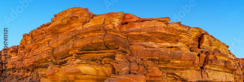 Colourful rock strata form the walls of the Coloured Canyon near Nuweiba, Egypt in summer