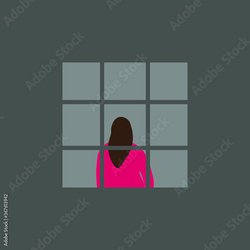 Woman at the window behind bars
