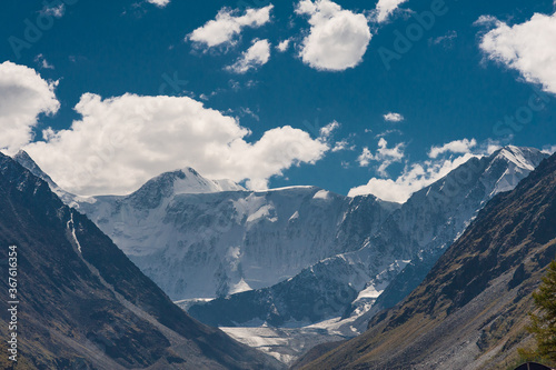 view of Mount Beluha in sunny weather with clouds