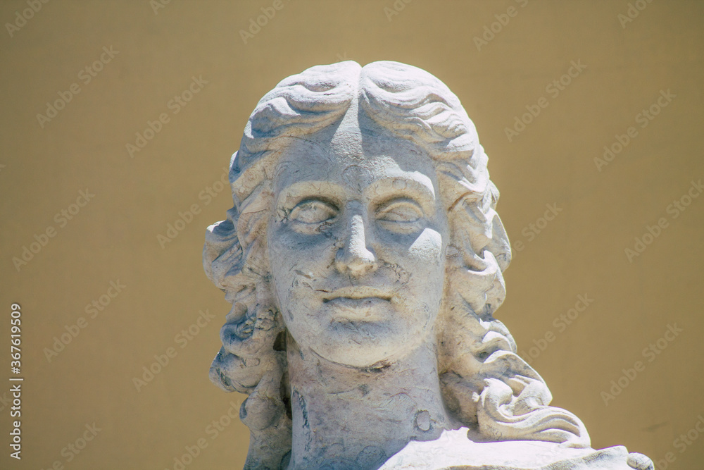 Closeup of the statue front the Carlos Lopes pavilion located in the Eduardo VII park of Lisbon, the hilly coastal capital city of Portugal