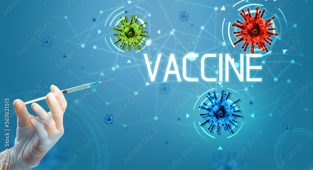 Syringe, medical injection in hand with VACCINE inscription, coronavirus vaccine concept Syringe, medical injection in hand with VACCINE inscription, coronavirus vaccine concept
