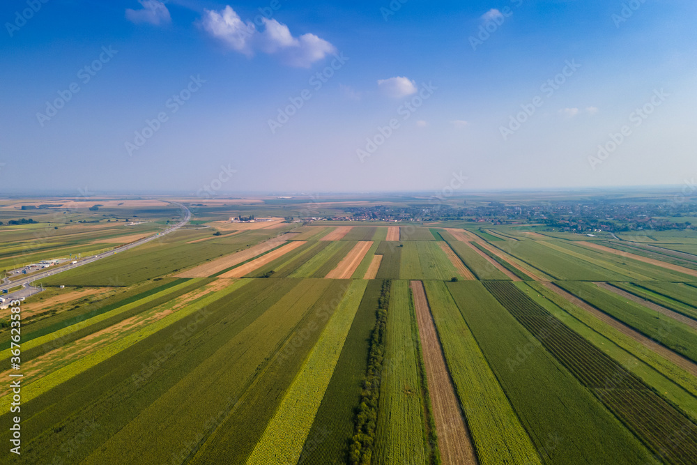 agriculture field from aerial view in serbia near highway