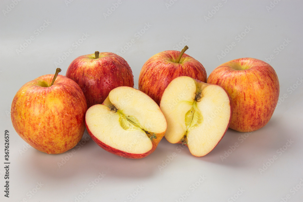 Selected apples and apple slices over white background Selected apples and apple slices over white background