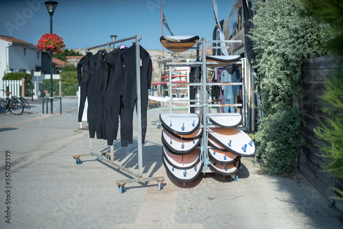 Shortboard and  Surfing Suits. Surfing club by the sea.