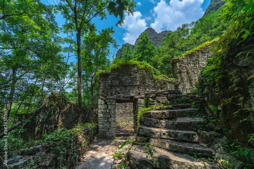 Ruins of abandoned jungle village in China