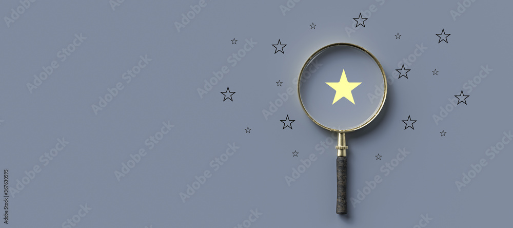 magnifying glass with a yellow star mark as symbol for finding a 