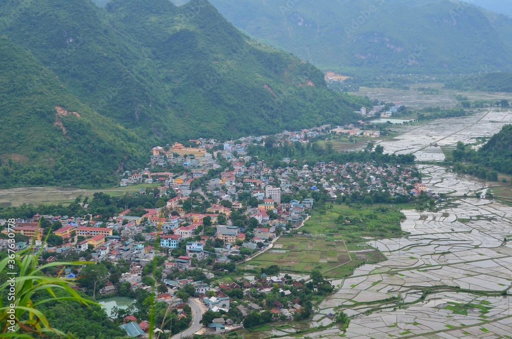 View of Mai Chau district in Vietnam with villages and rice fields