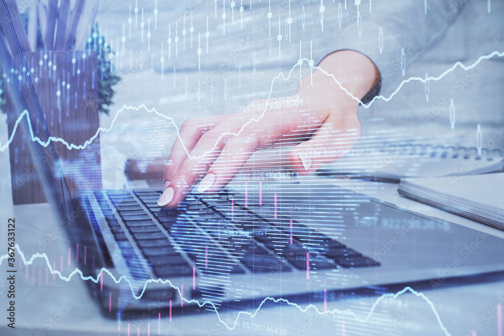 Multi exposure of woman hands typing on computer and forex chart hologram drawing. Stock market analysis concept. Multi exposure of woman hands typing on computer and forex chart hologram drawing. Stock market analysis concept.