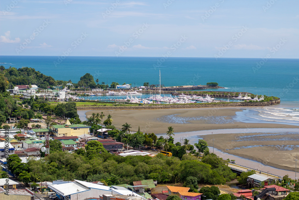 Quepos, Costa Rica. Vista desde mirador en el centro de Quepos, al fonfo la Marina Pez Vela y demás edificaciones del cantón.