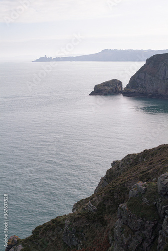 Rocky shore with mist on the background