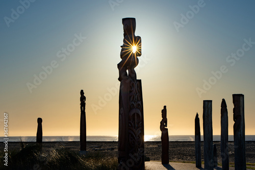 Traditional maori carvings part of Ātea a Rangi star compass, Clive, New Zealand photo