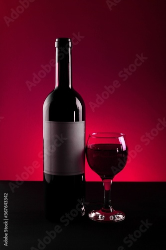 Glass Of Wine And Wine Bottle With Blank Label