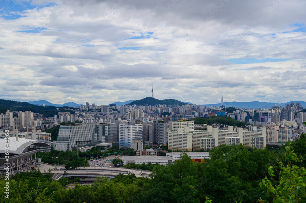 Seoul city skyline and Seoul tower modern building and architecture, Beautiful clouds flow through Seoul city skyline and Seoul tower modern building and architecture, Beautiful clouds flow through