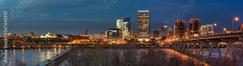 Panoramic shot of Richmond VA after sunset with city lights.