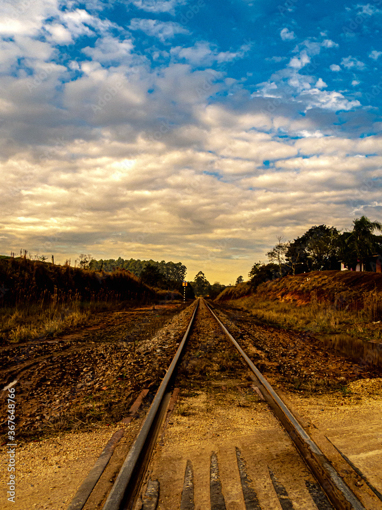 Fototapeta premium railway in the sunset