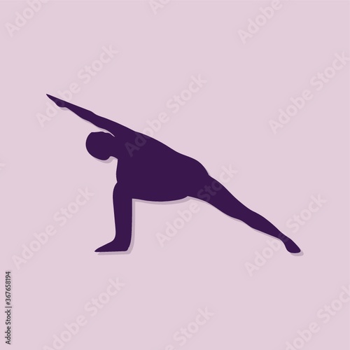 girl silhouette practising yoga in extended side angle pose