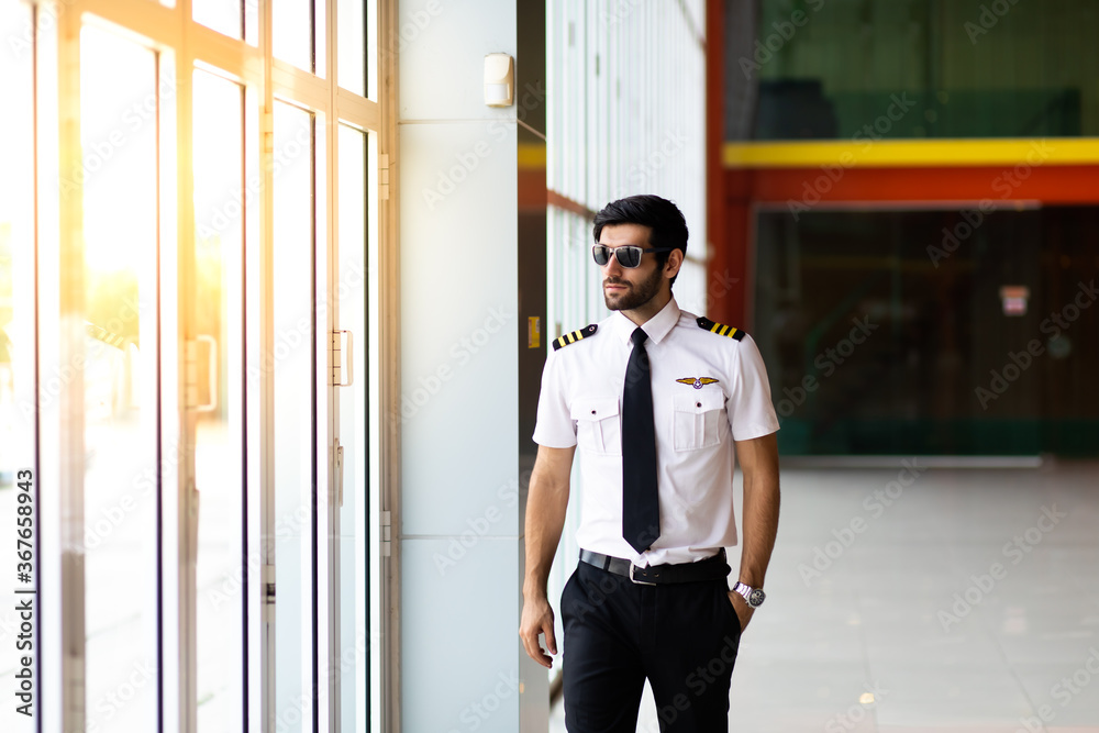 Portrait of helicopter commercial pilot in uniform Portrait of helicopter commercial pilot in uniform