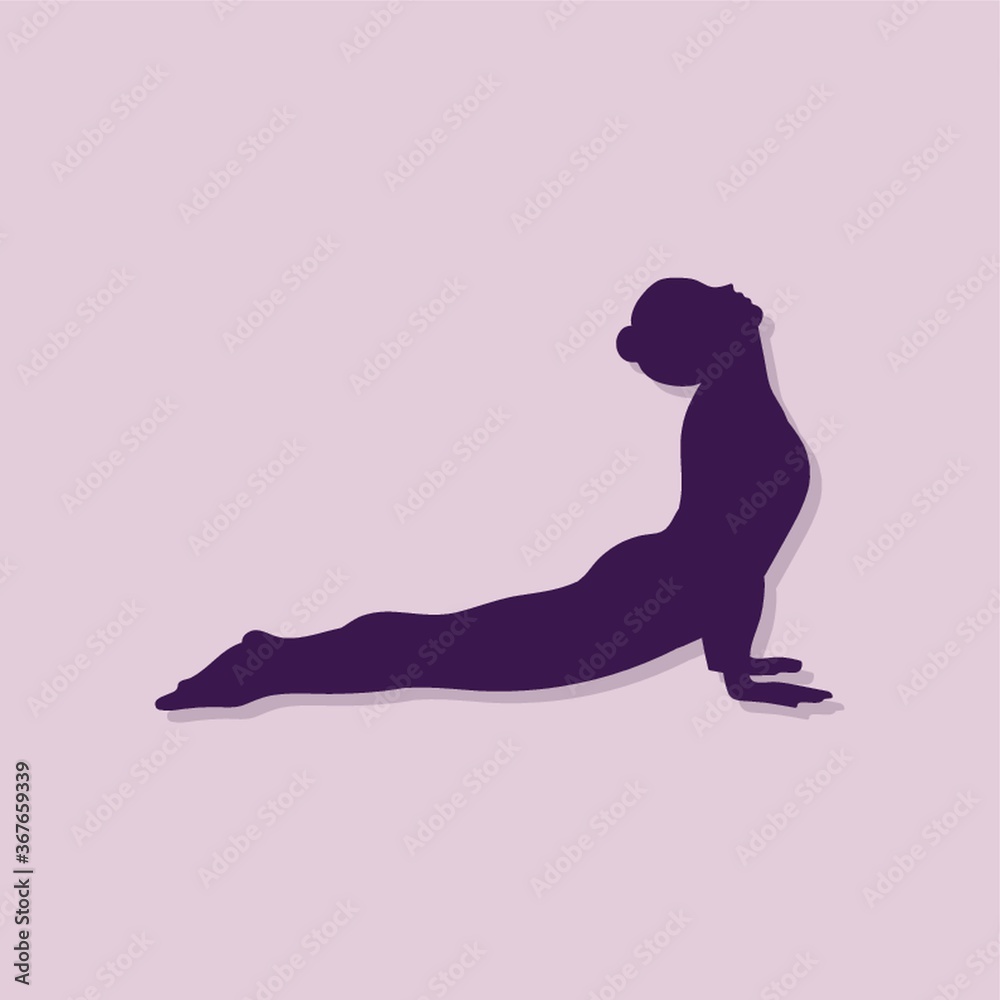 girl silhouette practising yoga in upward facing dog pose