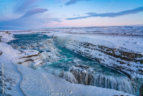 Gullfoss Waterfall in golden circle, Iceland, in winter time, at sunset. 