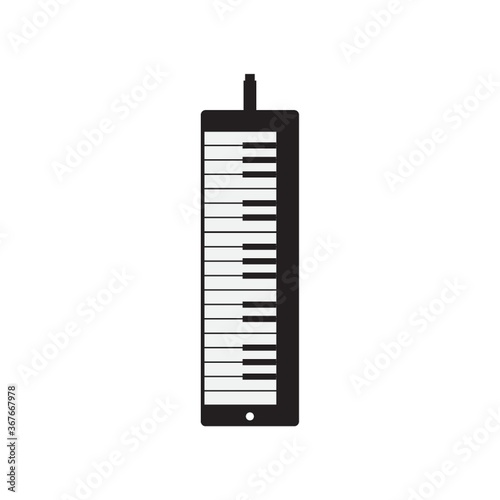 silhouette of piano