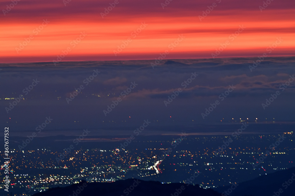 Dramatic Sunset Color over the sky and San Francisco South Bay Citilight