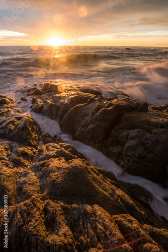 Sunset along the rugged , Sea sunrise at thailand