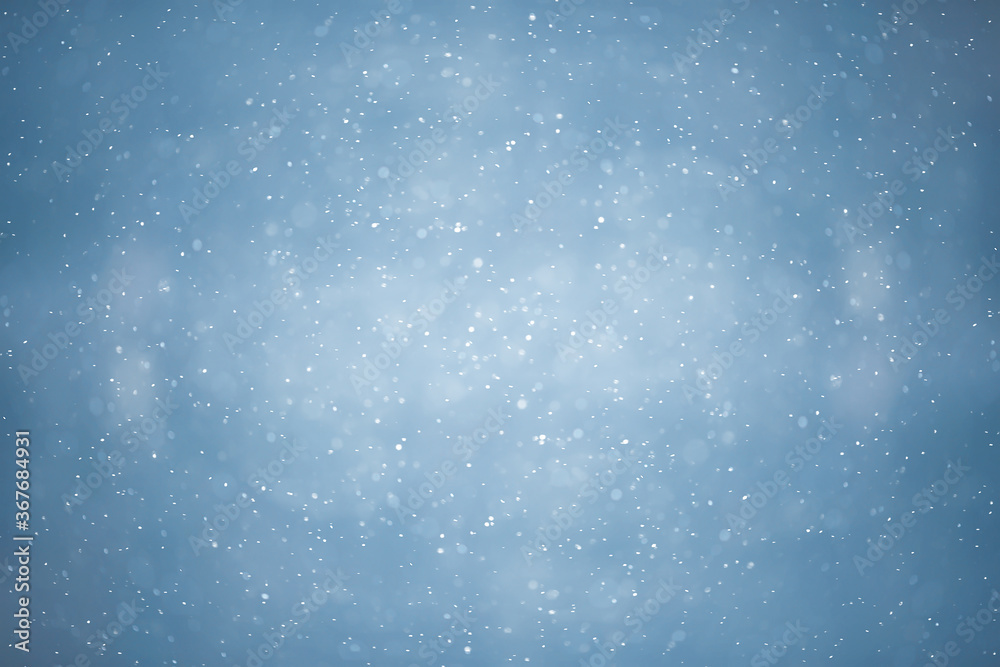 blue snowfall bokeh background, abstract snowflake background on blurred abstract blue blue snowfall bokeh background, abstract snowflake background on blurred abstract blue