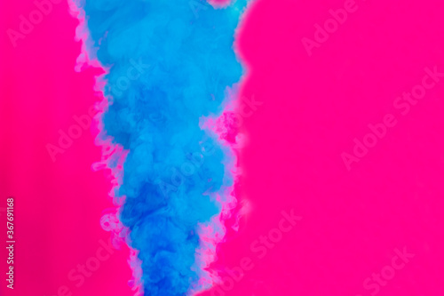 Smoke Bomb with blue smoke on rose background. Backgrounds and textures. © Alena