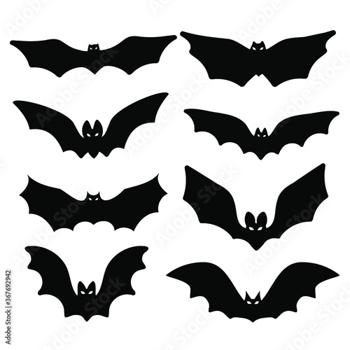 Bats silhouettes on the white background