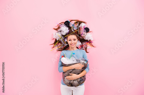 Top above high angle view photo positive volunteer girl have eco earth day hold rubbish plastic bags hair cup disposal beverage wear sweater jumper lay isolated pastel color background