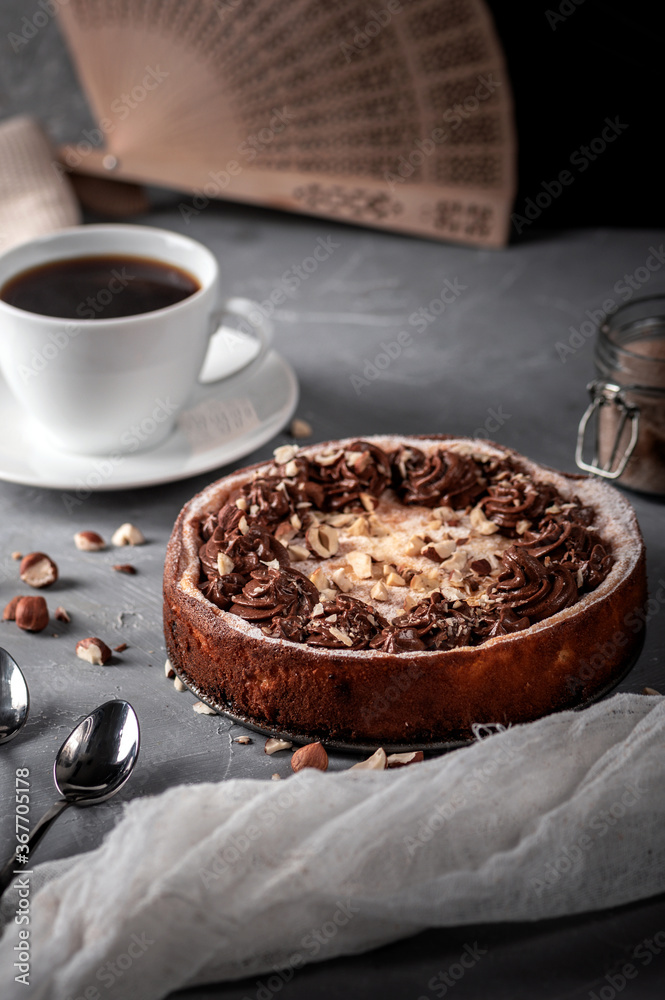 Homemade pie with nuts and chocolate ganache