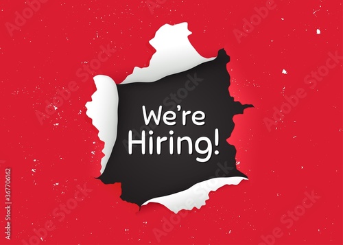 We're hiring symbol. Ragged hole, torn paper banner. Recruitment agency sign. Hire employees symbol. Paper with ripped edges. Torn hole red background. Hiring promotion banner. Vector
