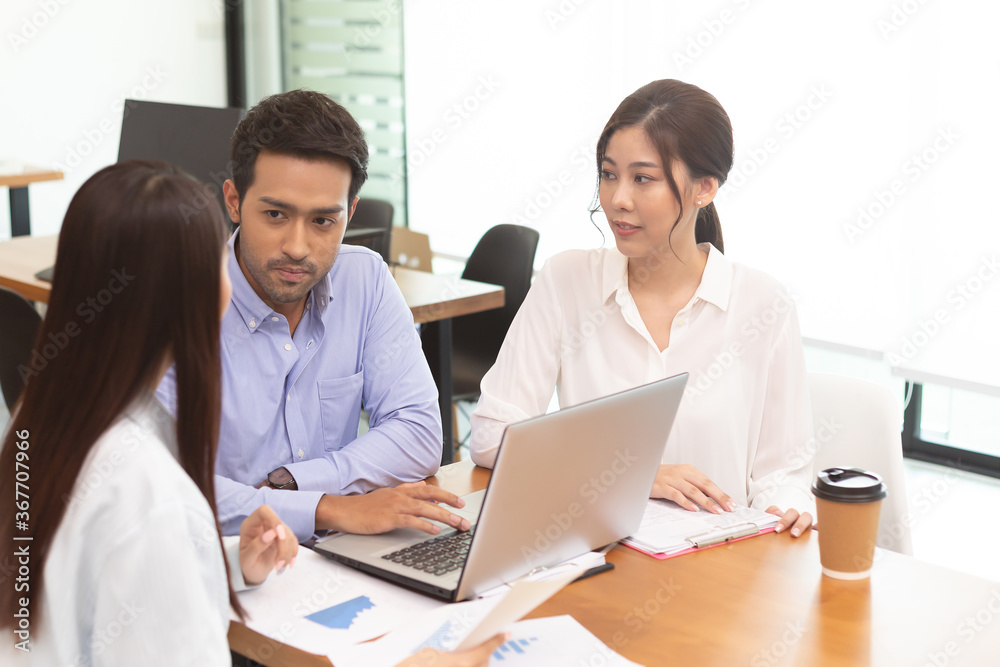 Asian business man and women meeting and talk about job in office. Asian business man and women meeting and talk about job in office.