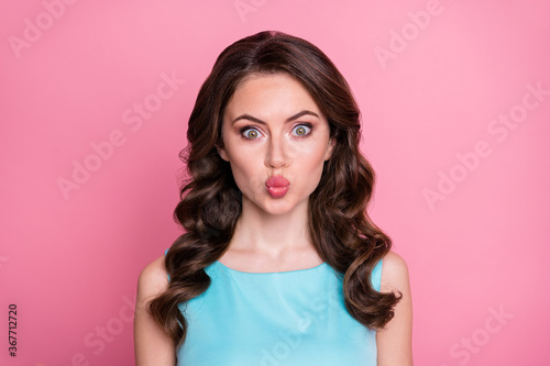 Closeup photo of attractive charming chic wavy lady students event festive party prom queen send air kisses friends wear turquoise prom dress isolated pastel pink color background