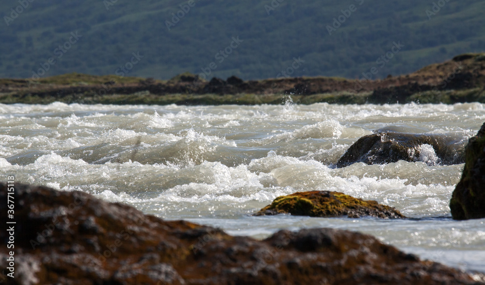 Upstream rapids near Godafoss waterfall in northern Iceland