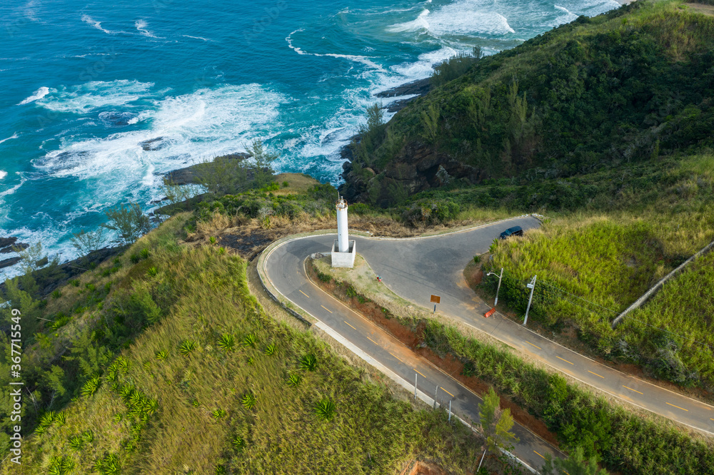 Beautiful view of the lighthouse and the sea. Ponta Negra Lighthouse. The city of Ponta Negra, State of Rio de Janeiro, Brazil. 