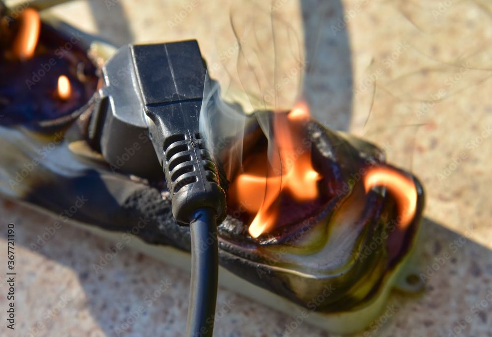 Outlets with switche caught fire in room. Overloaded electrical current