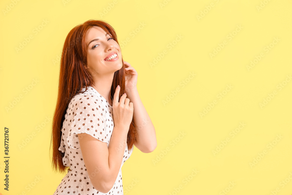Beautiful redhead woman on color background Beautiful redhead woman on color background