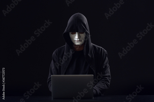 Professional hacker using l...