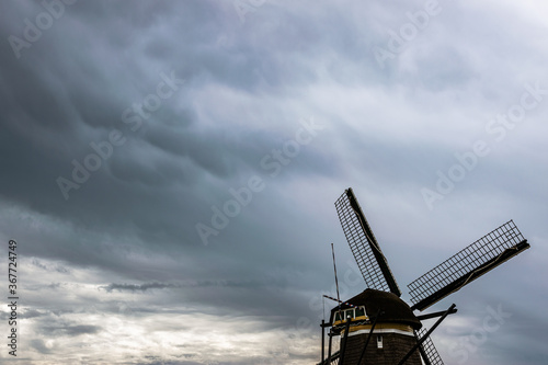 Mammatus clouds over a dutch windmill